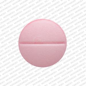 B another, any, everything. . Pink round pill with line on one side